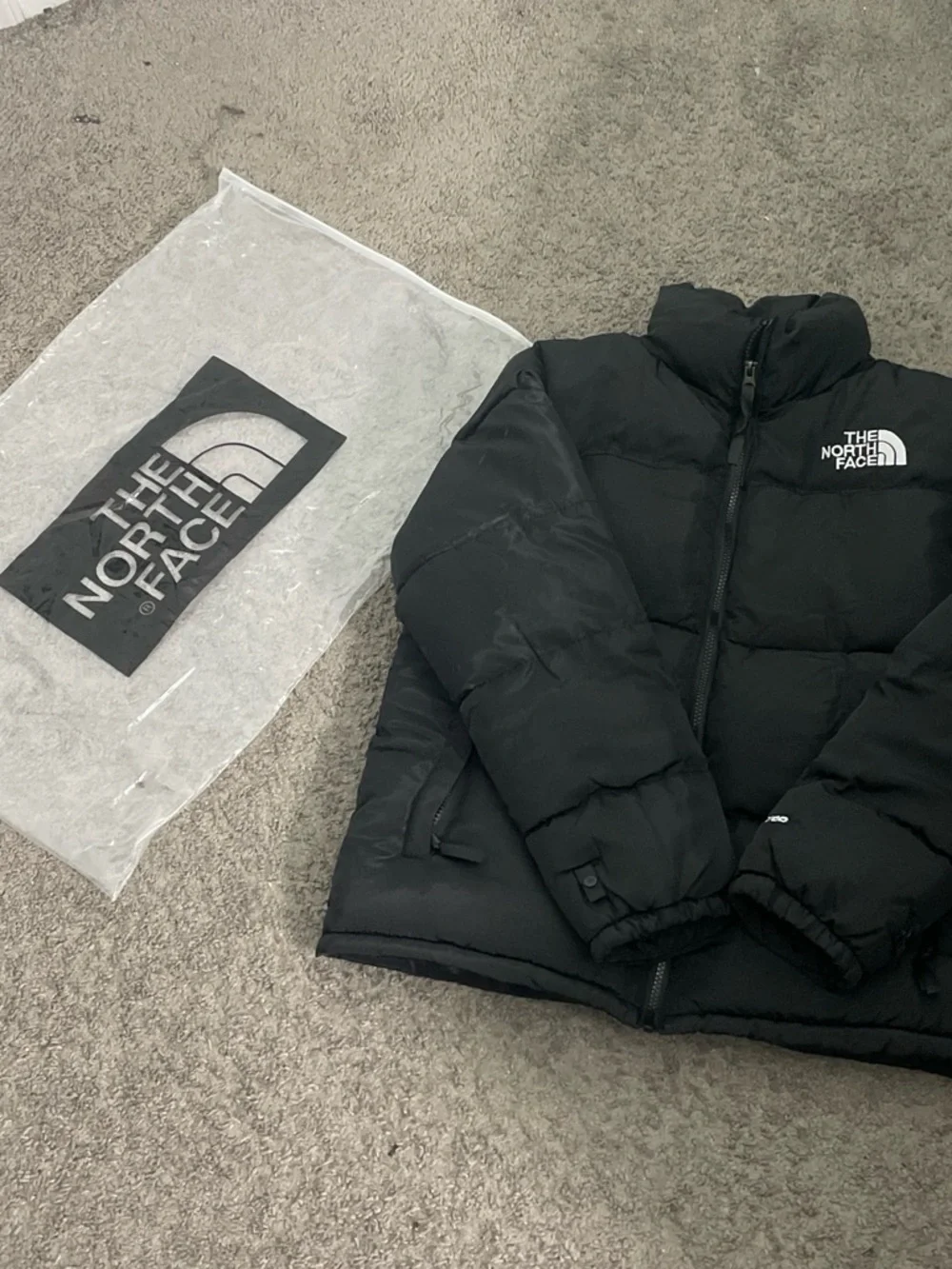 The North Face mens Black Puffer Jacket with Logo